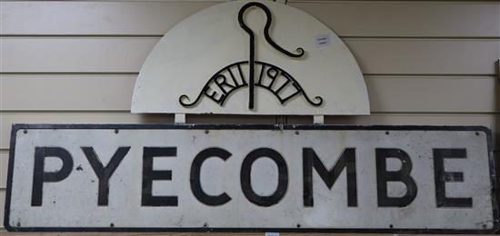 A metal village sign for the Village of Pyecombe, monogrammed ERII and dated 1977